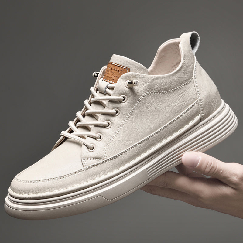 Man Holding Callan Ecru Leather Elevator Sneakers | Levante Shoes