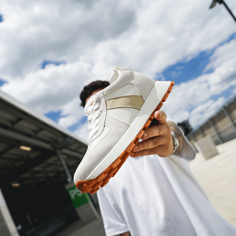 Man Holding Camden Ekevator Sneaker to Camera | Levante Shoes