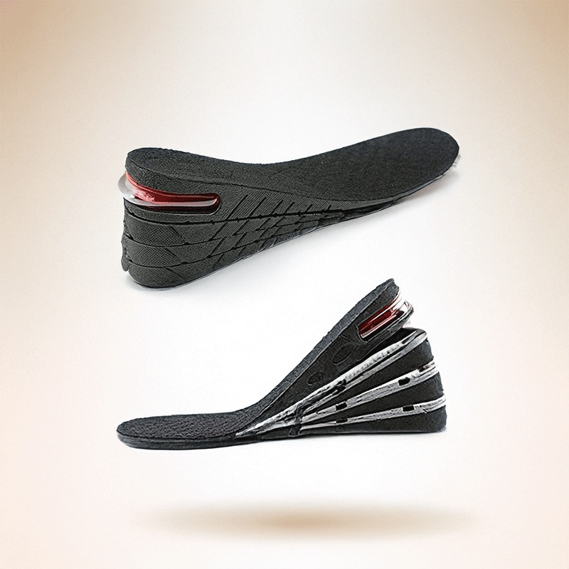 A pair of ergonomic shoe insoles showcasing a sleek design with cushioned support and a contrasting red accent for added style.