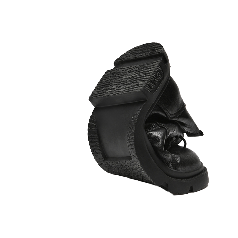 Bottom View of Exavo Elevator Boots Flexibility | Levante Shoes