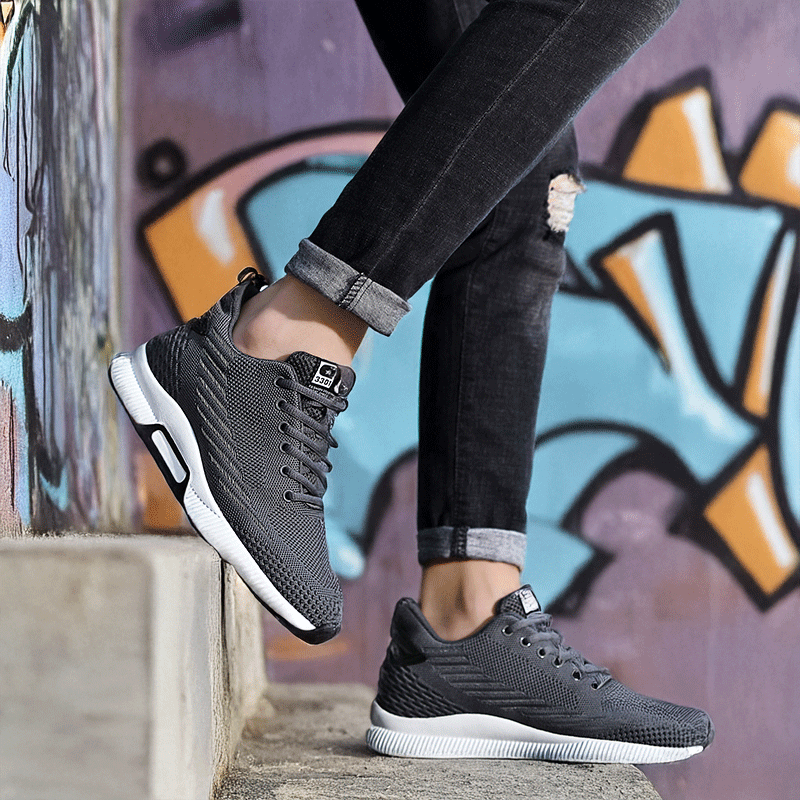Man Standing on Steps in Maverick Grey Elevator Sneakers | Levante Shoes
