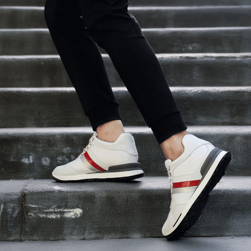 Man Walking Up Stairs in Retron White Elevator Sneakers | Levante Shoes