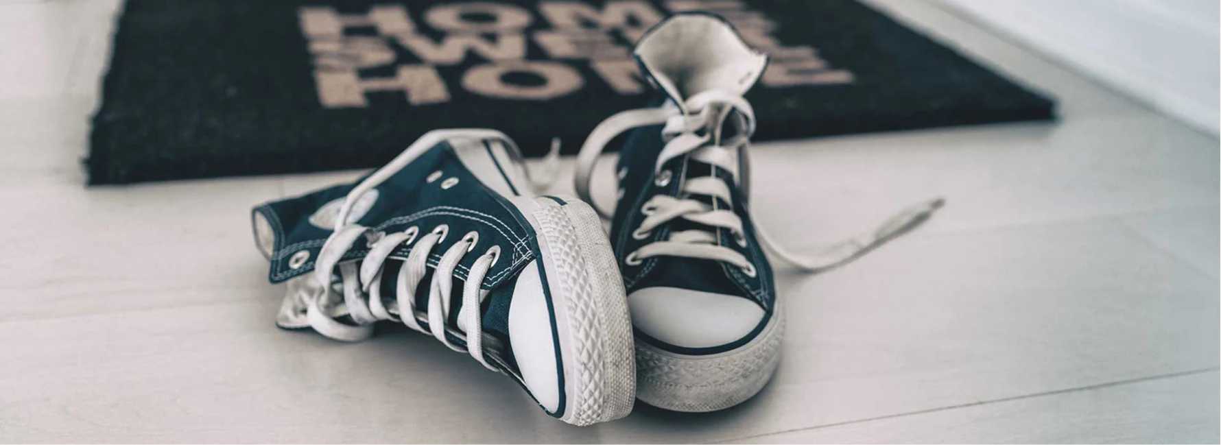 Image of Sneakers on a Mat | What Do Your Sneakers Say About You?