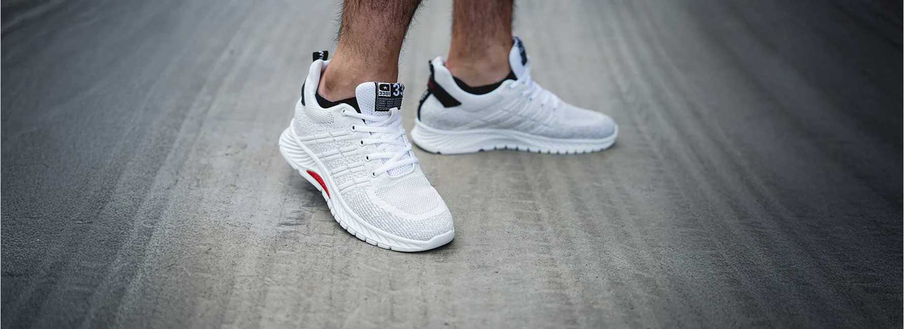 image of man wearing elevator sneakers on concrete