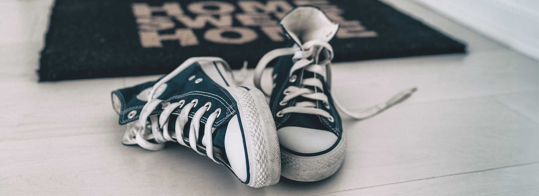 Image of Sneakers on a Mat | What Do Your Sneakers Say About You?