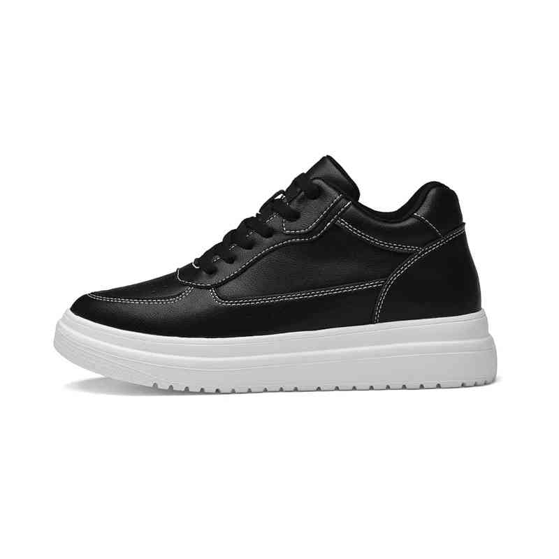 Side View of Black Elevator Sneakers