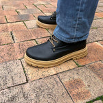 Side View of Man Standing in Rockie Black Elevator Boots | Levante Shoes