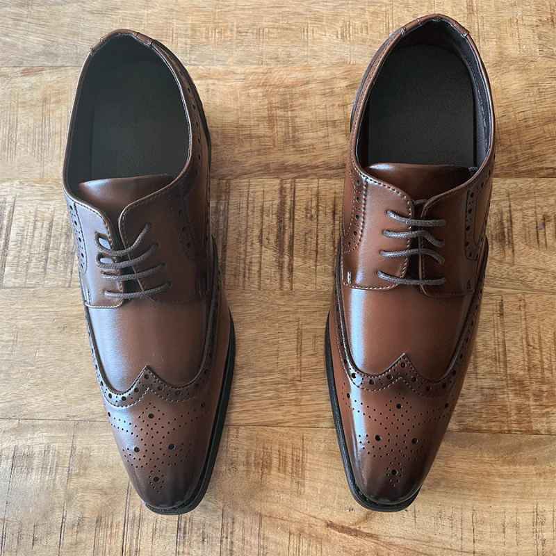 Top View of Royce Elevator Brogues in Brown on Wooden Floor | Levante Shoes
