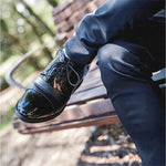 Man Sitting Cross Legged in Ashford Elevator Shoes | Levante Shoes