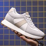 Hand Holding Grey Camden Elevator Sneaker | Levante Shoes
