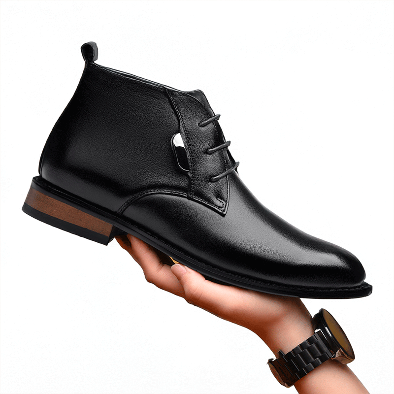 Man Holding Domani Black Leather Elevator Boot | Levante Shoes