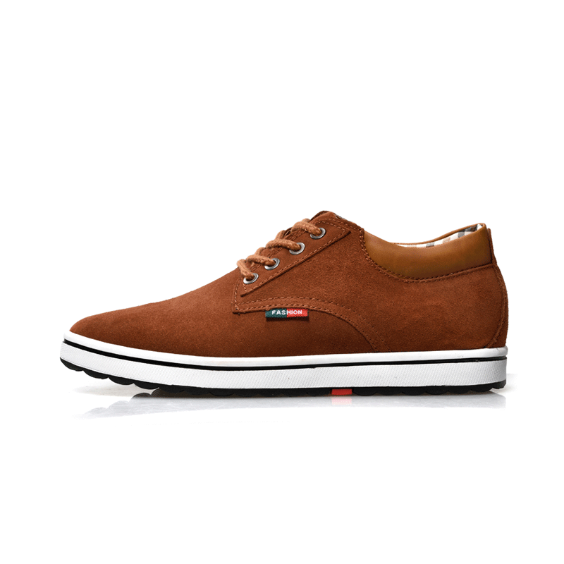 Brown elevator sneaker with a white sole on a white background