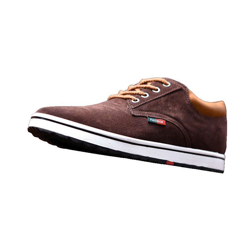 Brown sneaker with white sole on a white background