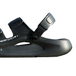 Black height boosting sandal with a strap on a white background