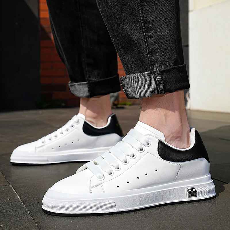 wideshot of white elevator sneakers